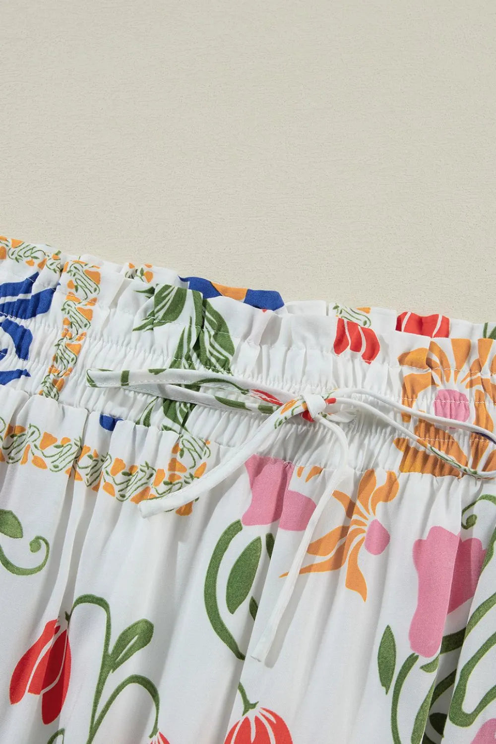 Trendsi casual comfortable clothing set featuring a floral print with an elastic waistband and drawstring detail