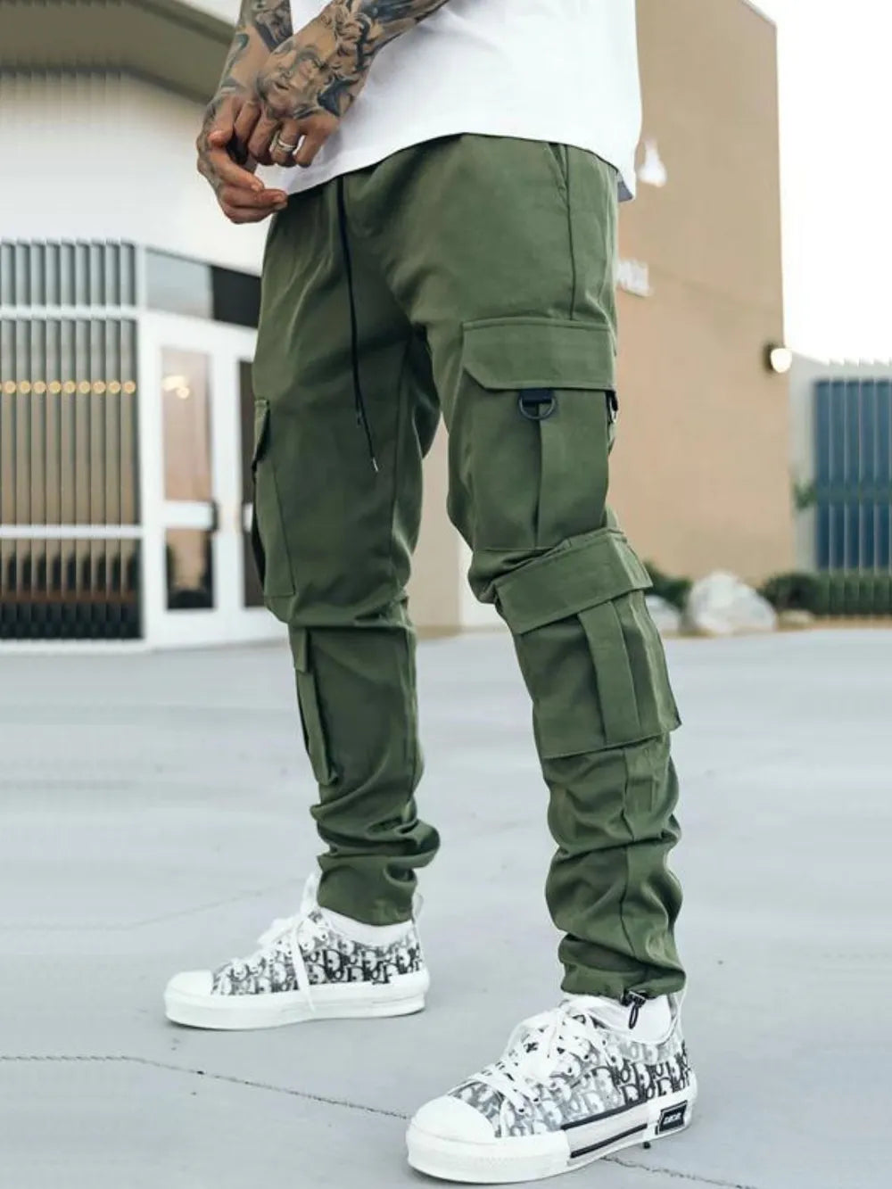Stylish green comfortable cargo pants for men featuring multiple pockets and a modern fit