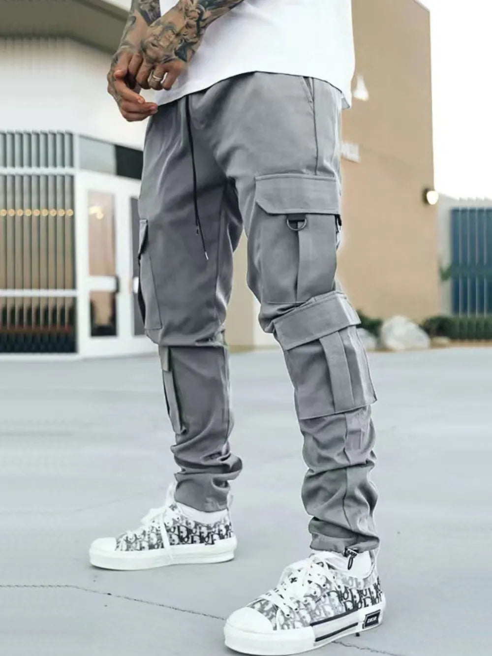 Stylish comfortable cargo pants for men in gray with multiple pockets and a relaxed fit