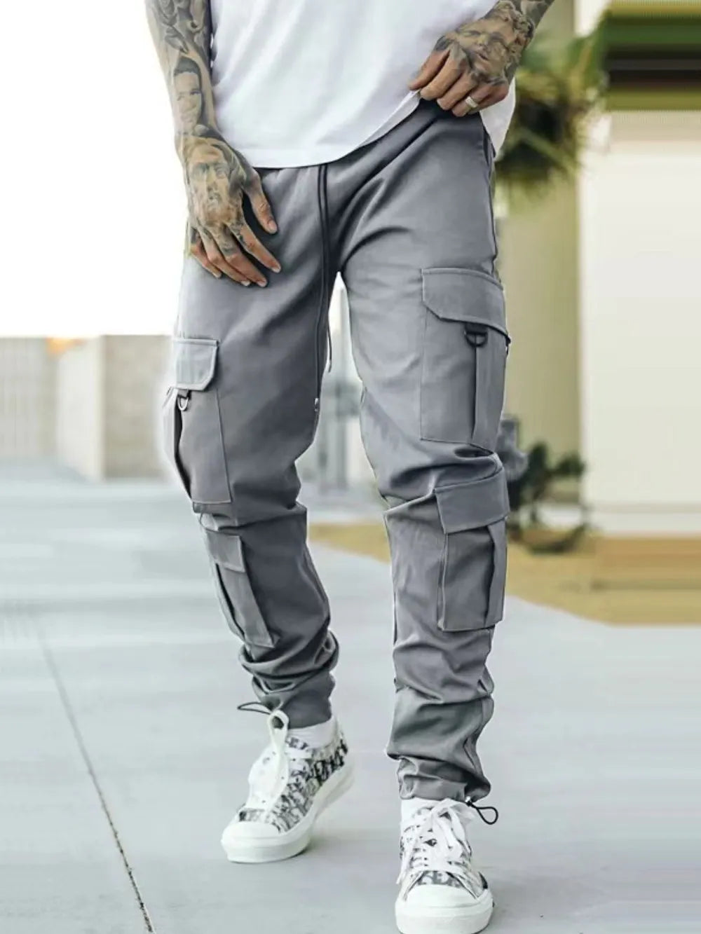 Trendsi comfortable cargo pants for men in gray with multiple pockets and a tapered fit