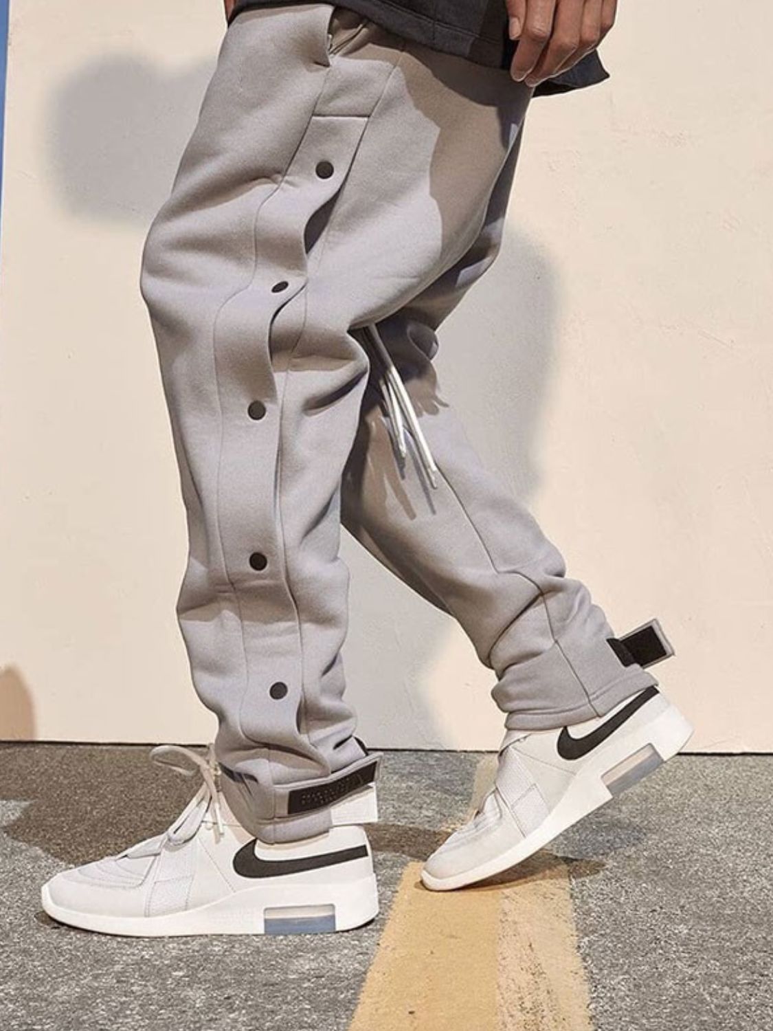 Trendsi comfortable men's pants in light gray with stylish snap details and relaxed fit