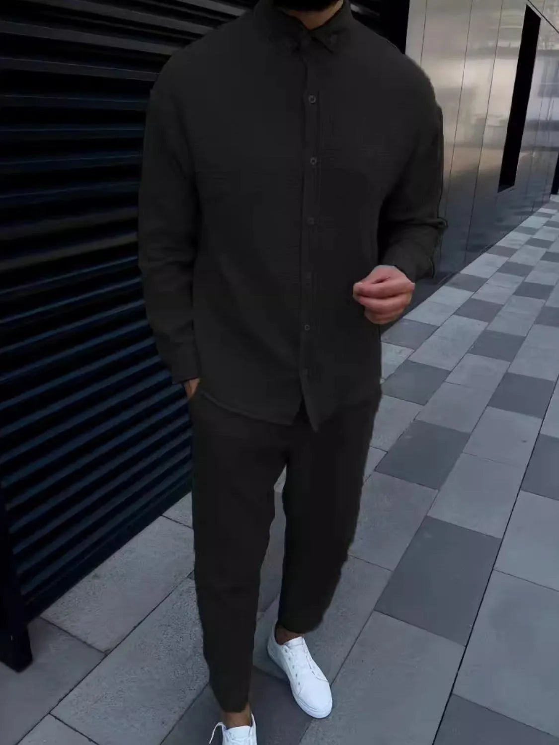 Trendsi long sleeve shirt set for men in dark color paired with matching pants and white sneakers