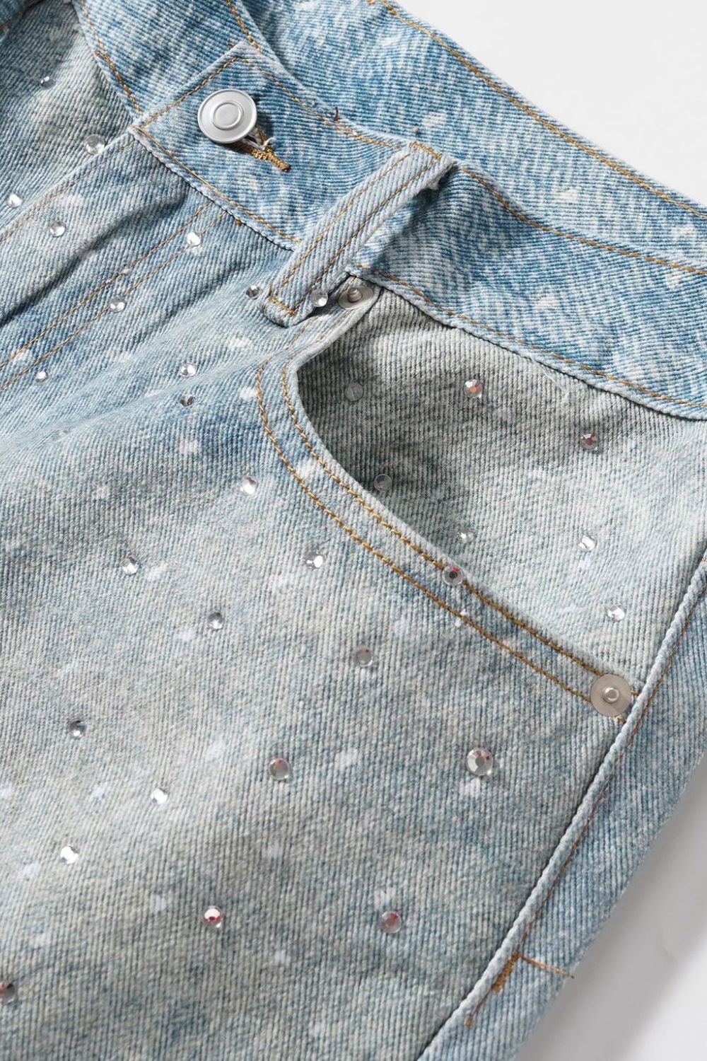Men's rhinestone denim shorts featuring a light wash and embellished design for a stylish look