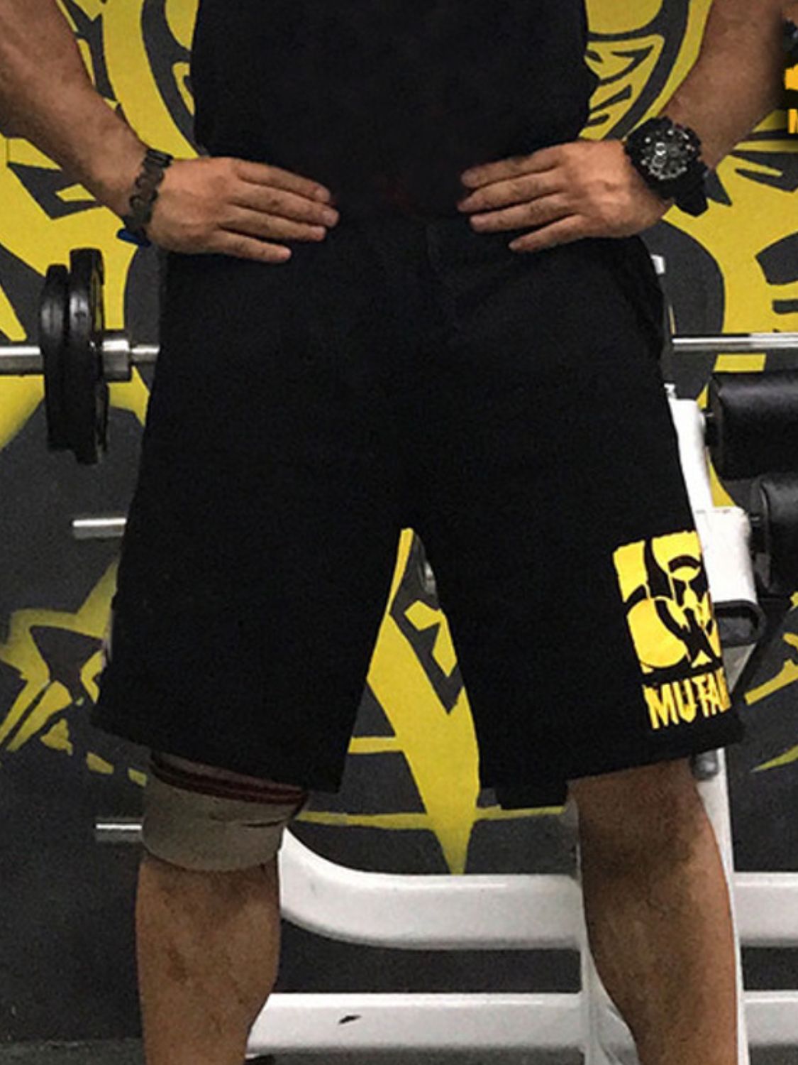 Black men's gym shorts with logo, perfect for workouts and casual wear at affordable prices