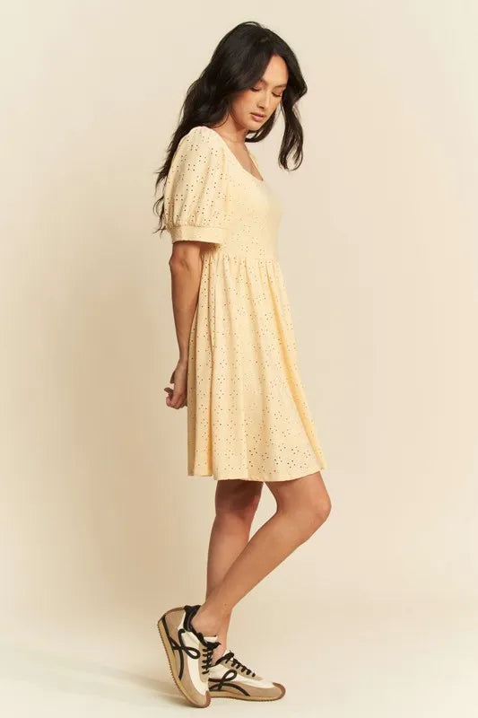 Trendsi romantic eyelet baby doll dress in soft yellow with puff sleeves