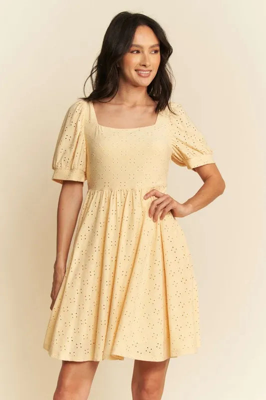 Trendsi romantic eyelet baby doll dress in soft yellow with puff sleeves and a square neckline