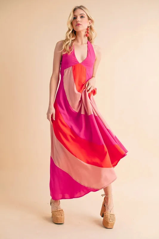 Trendy sleeveless color block maxi dress in vivid pink and peach hues for a stylish summer look