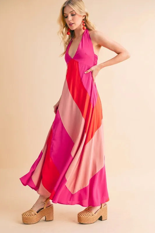 Stylish sleeveless color block maxi dress with vibrant pink and orange hues, perfect for summer outings
