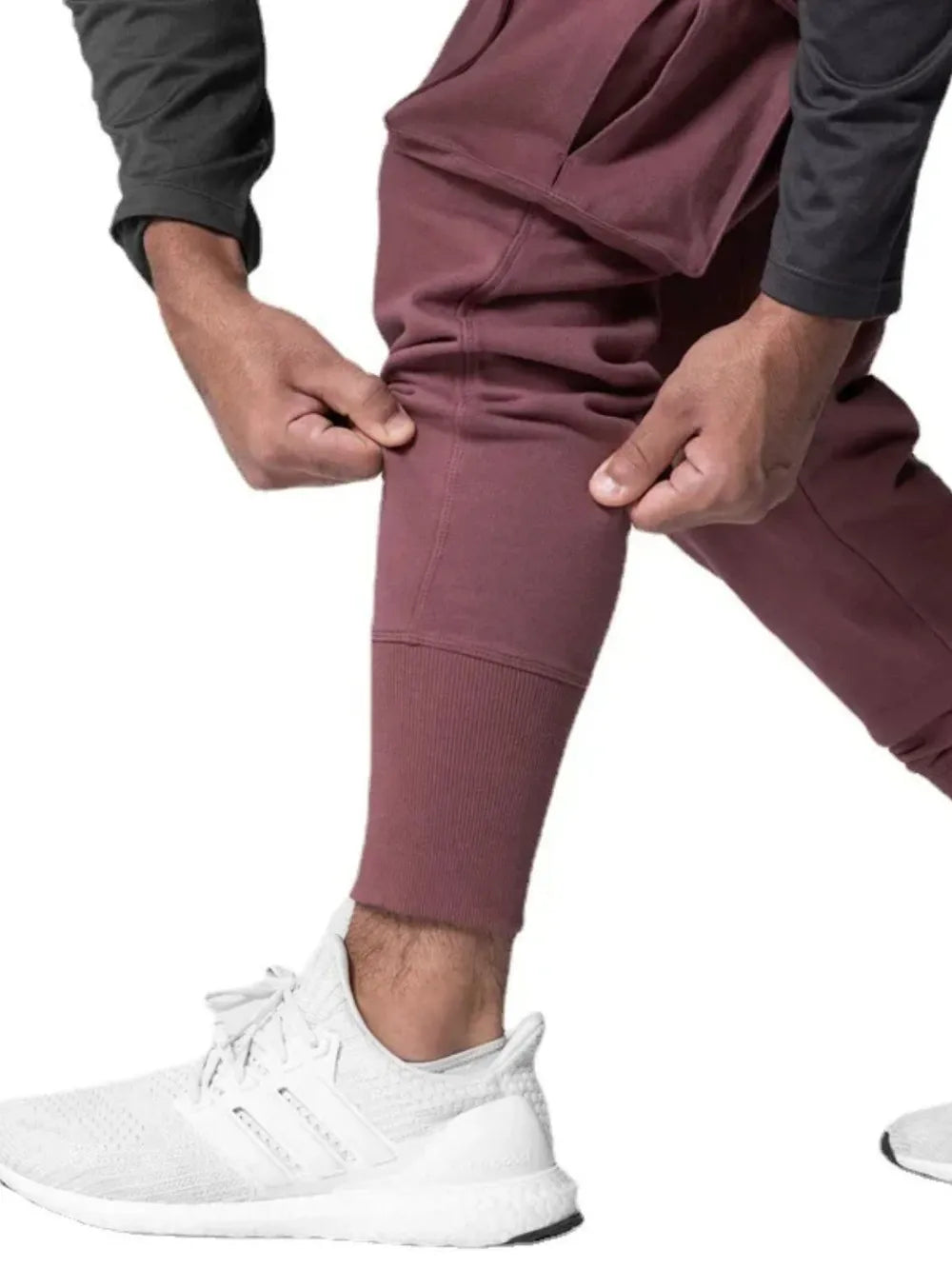 Trendsi stylish jogger pants with pockets in maroon, featuring a tapered fit and soft fabric