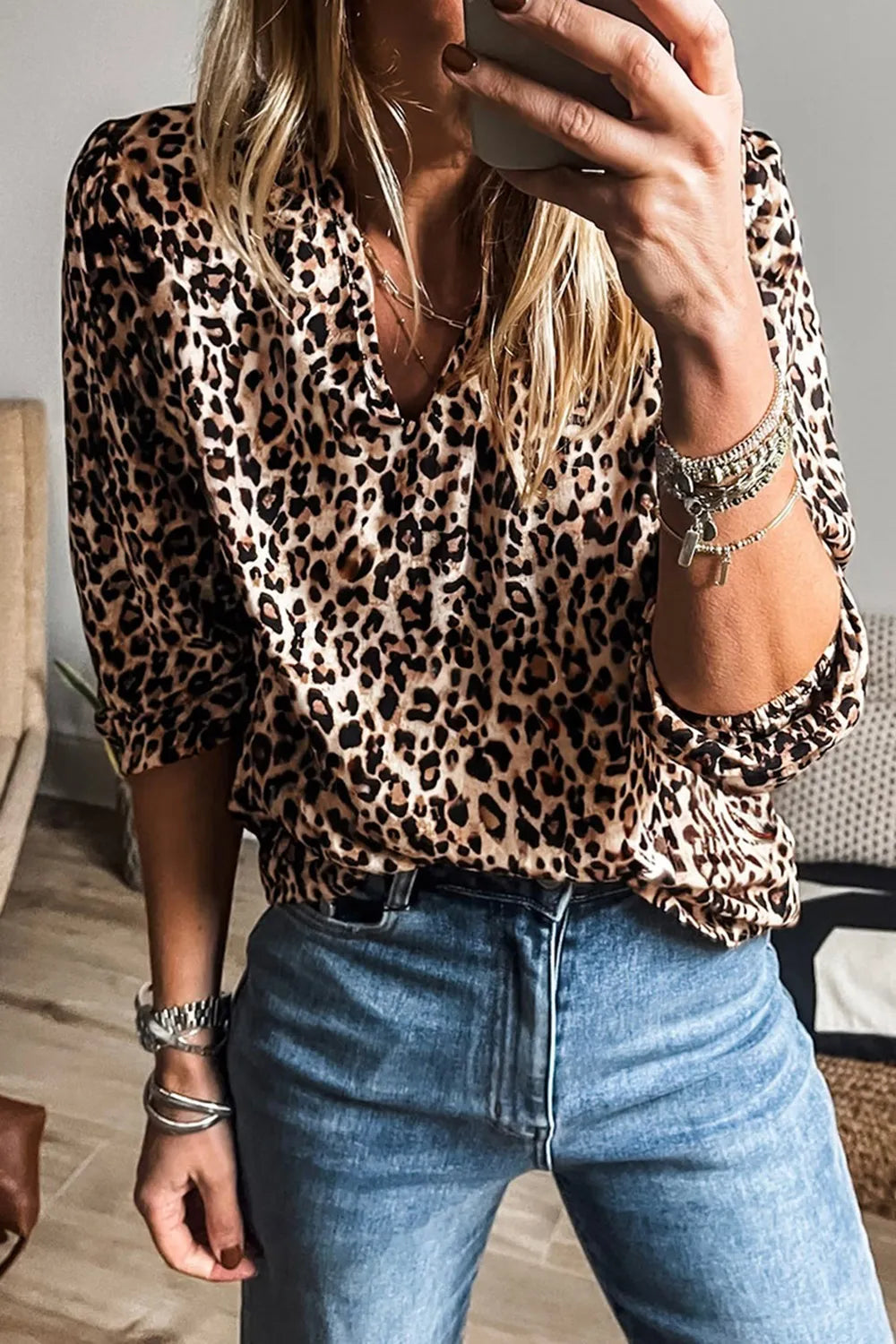 Trendsi stylish leopard print top paired with light blue jeans for a trendy casual look