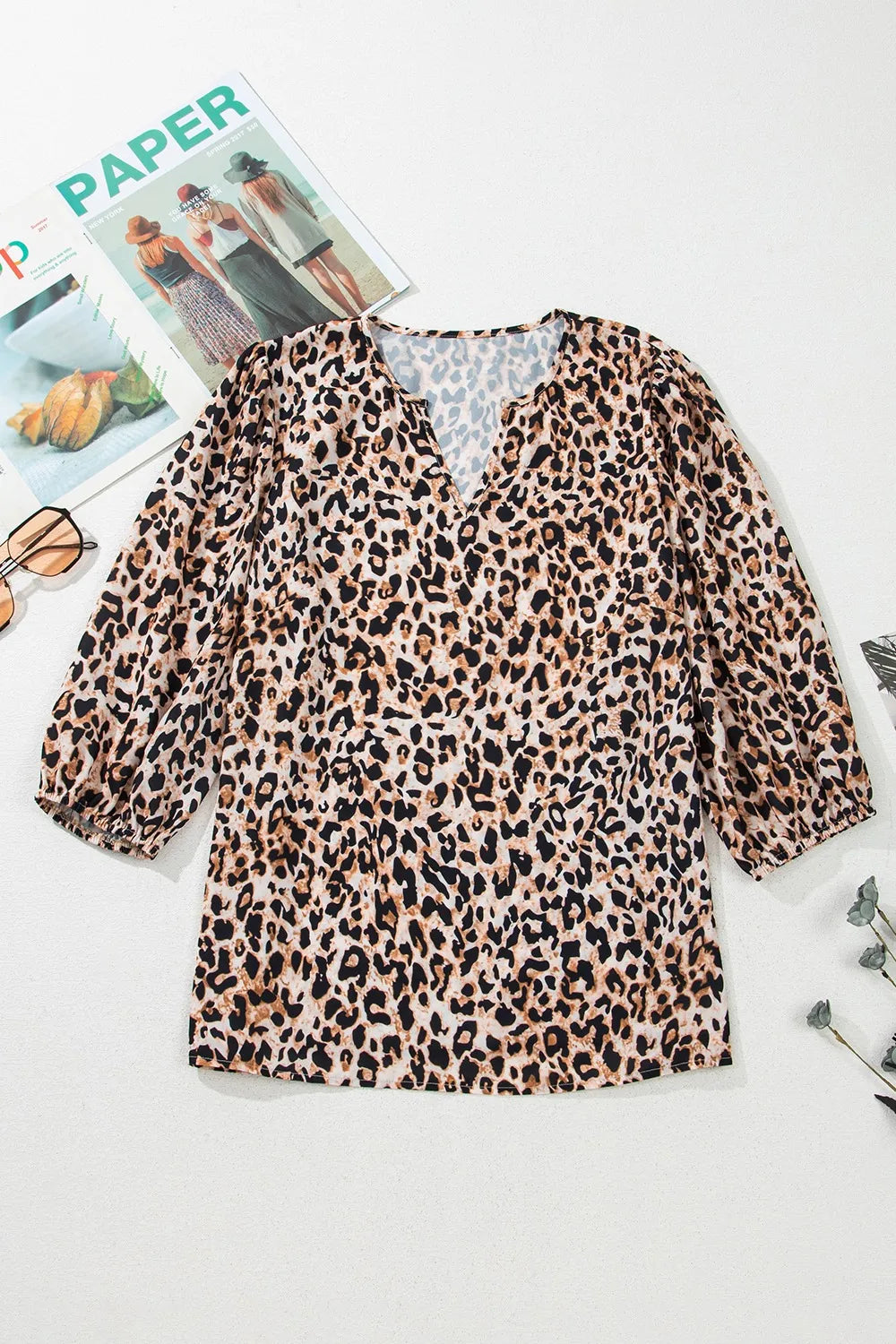 Trendsi stylish leopard print top with a flattering V-neck and puff sleeves for a trendy look