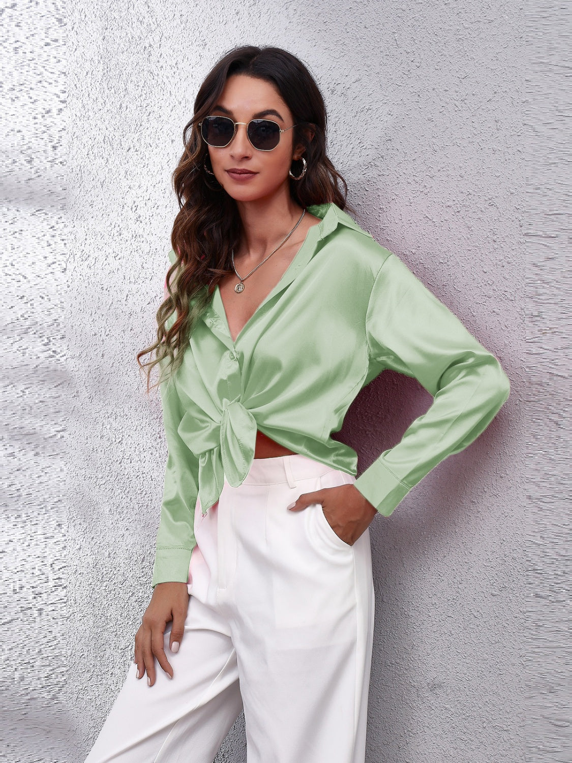 Stylish affordable long sleeve shirt in light green, featuring a tied front and relaxed fit