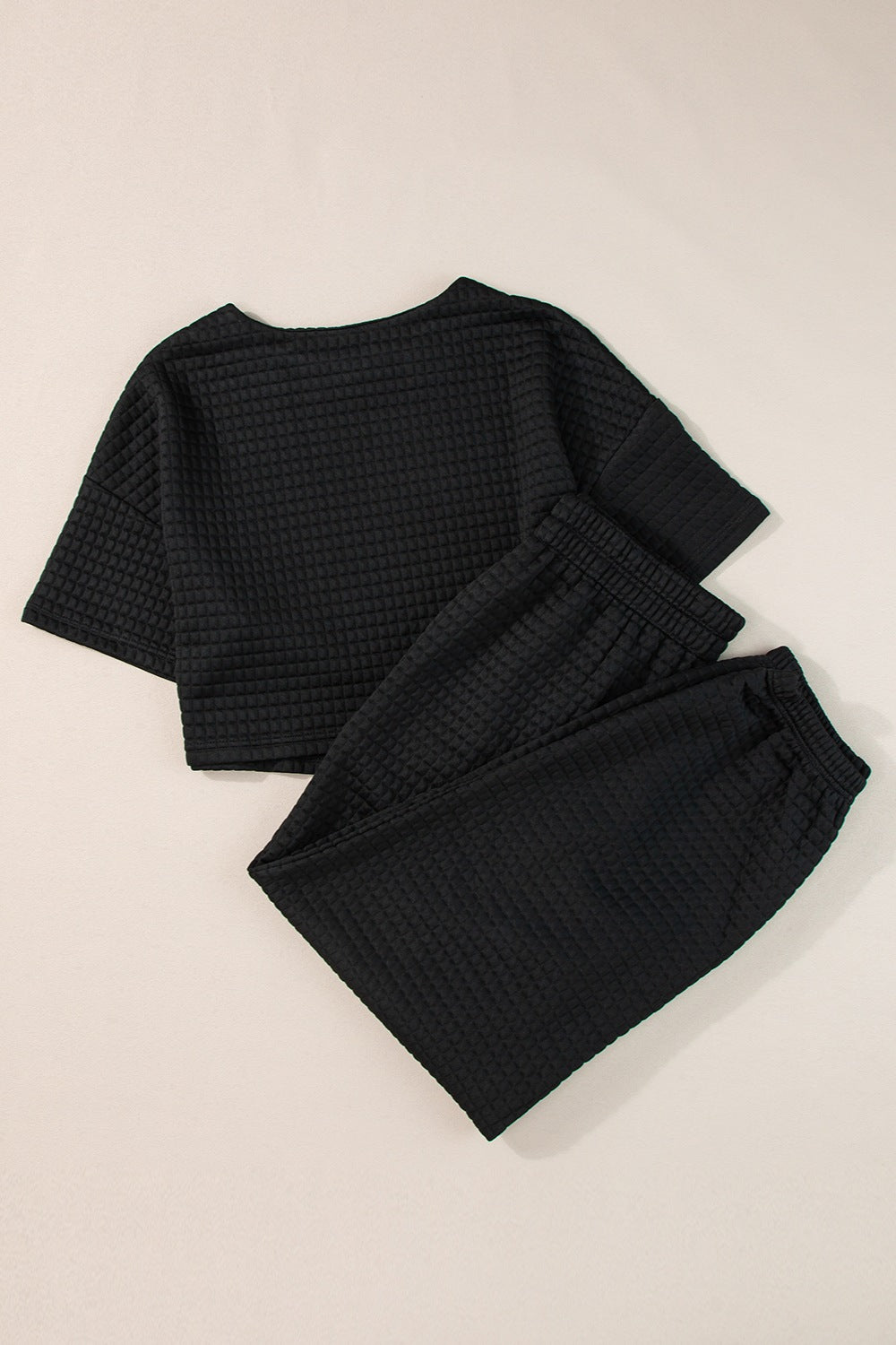 Trendsi black casual summer outfit featuring a short-sleeve top and elastic waistband pants