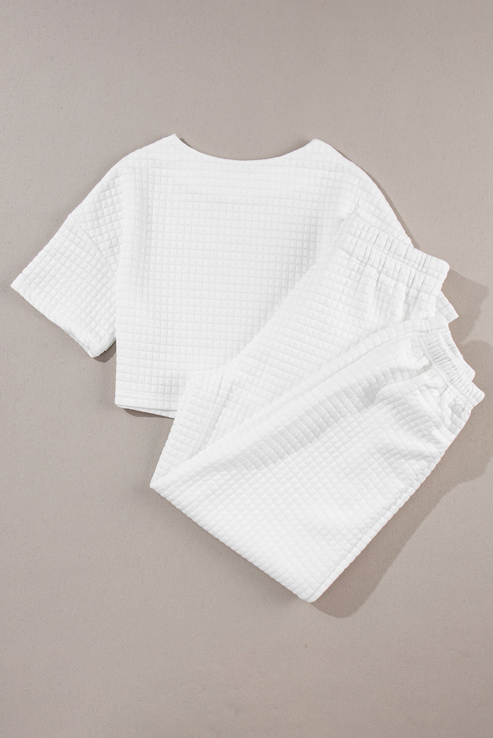 Trendsi casual summer outfit featuring a textured white crop top and matching pants for a relaxed look