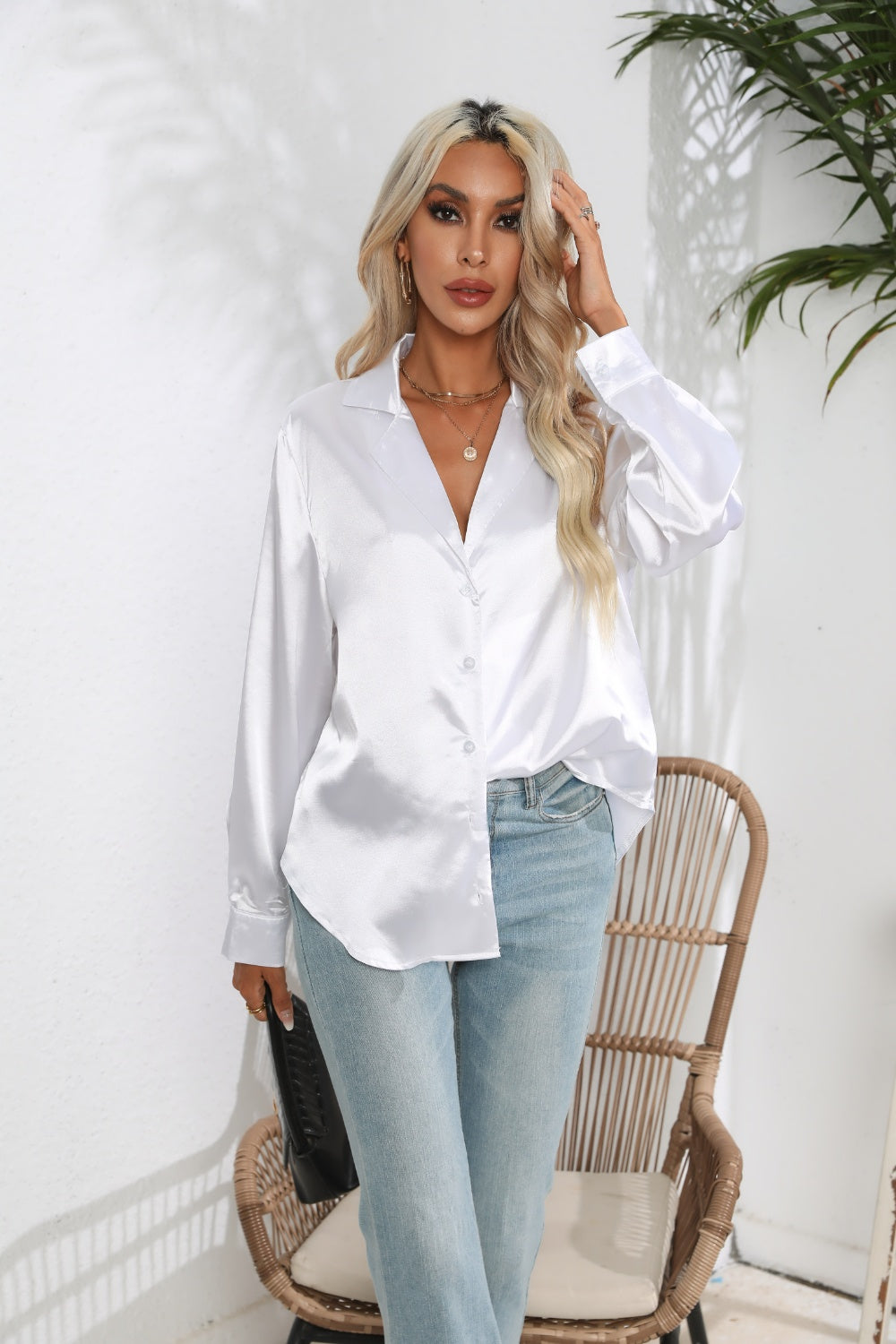 Trendsi Lapel Collar Long Sleeve Shirt in white, styled with light blue jeans for a chic look