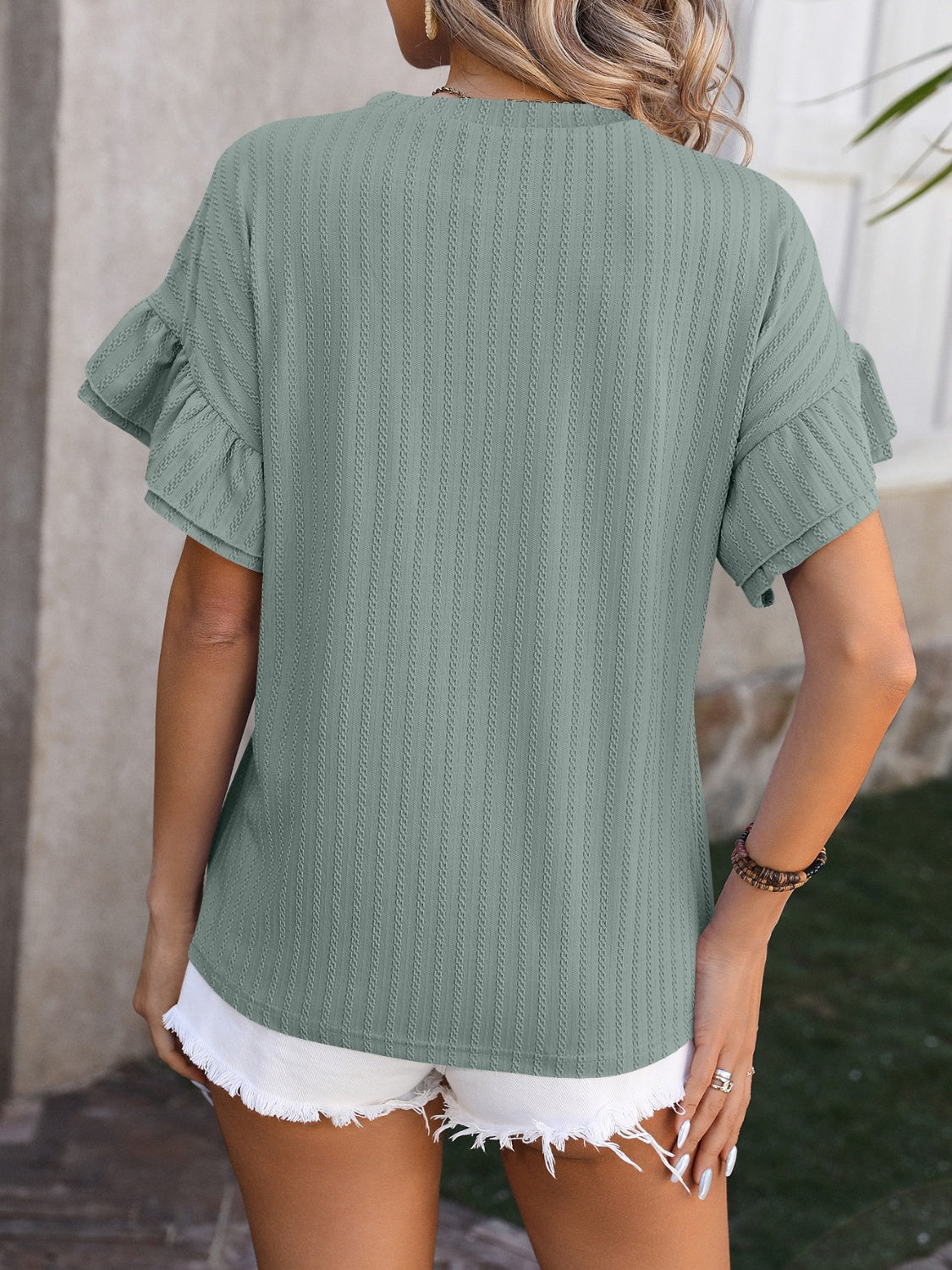 Trendsi ruffled short sleeve blouse in green with stylish texture and a relaxed fit