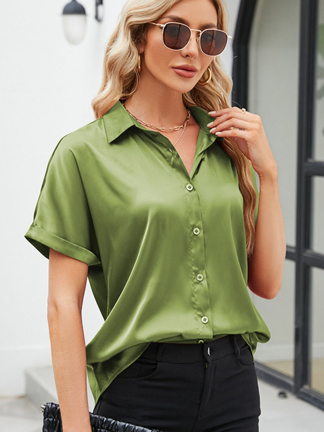 short sleeve casual shirt in olive green with a relaxed fit and button details