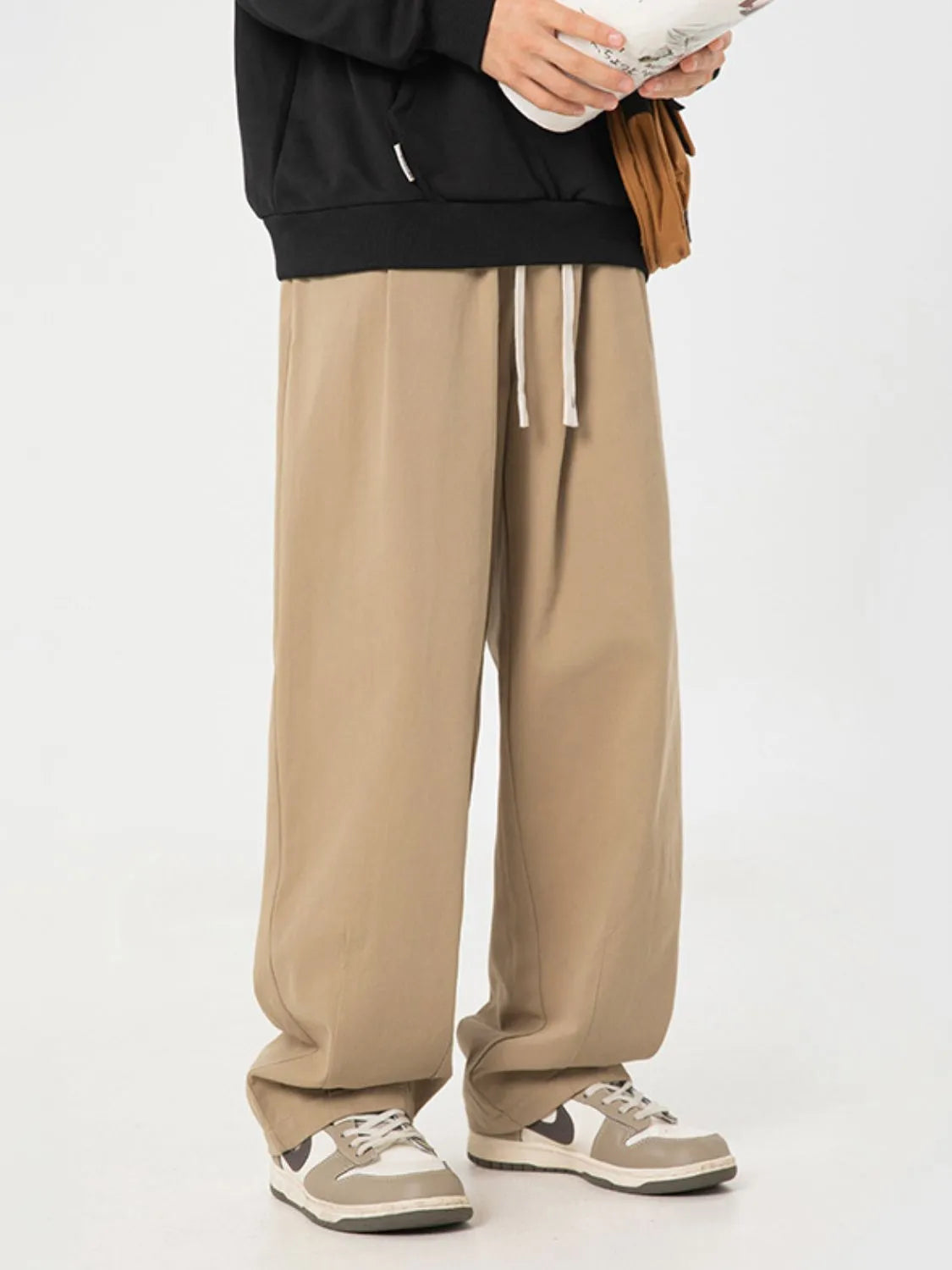 Trendsi versatile men's lounge pants in beige with a relaxed fit and drawstring waistband
