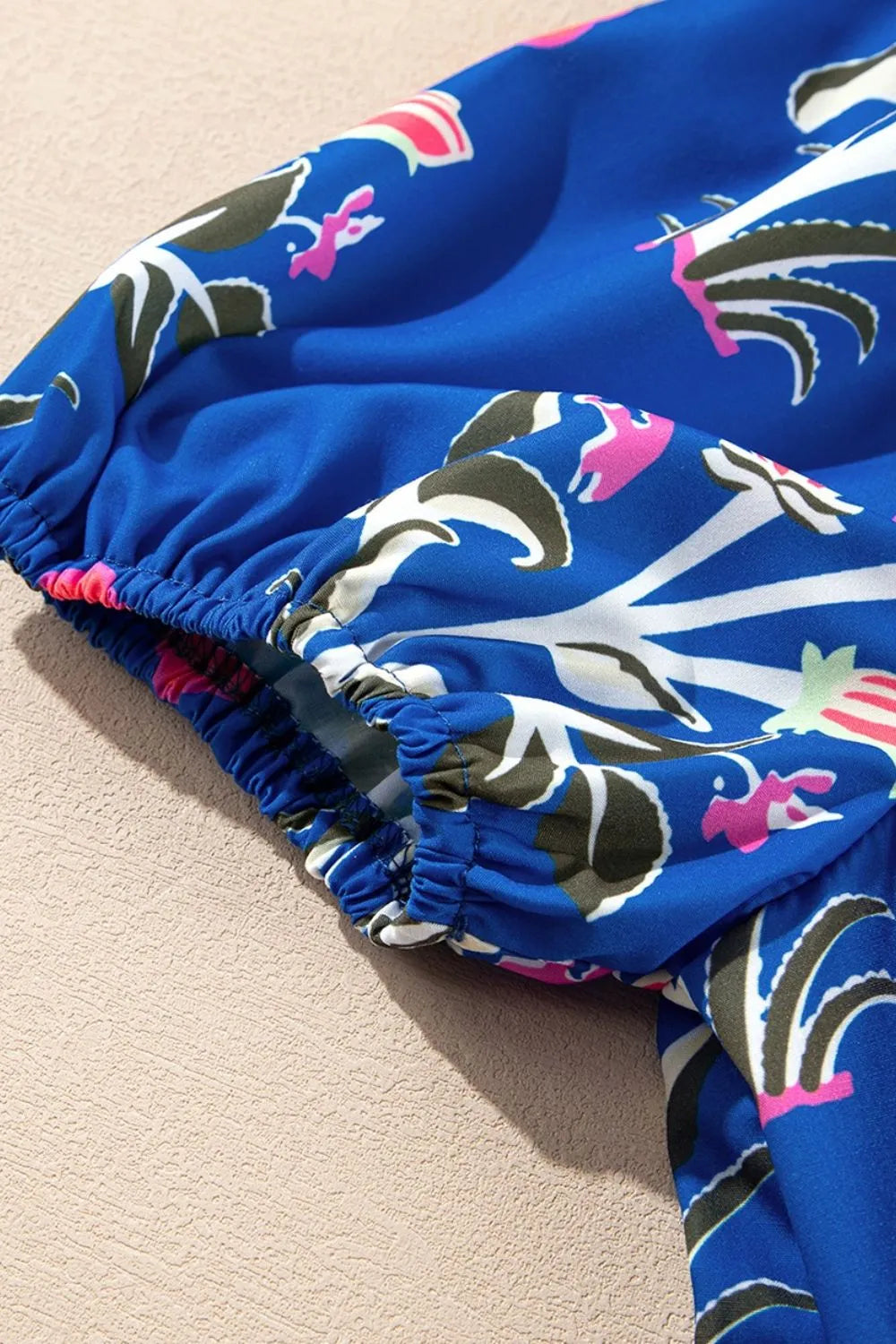 Trendsi women's high waist summer dress featuring a vibrant blue fabric with floral patterns