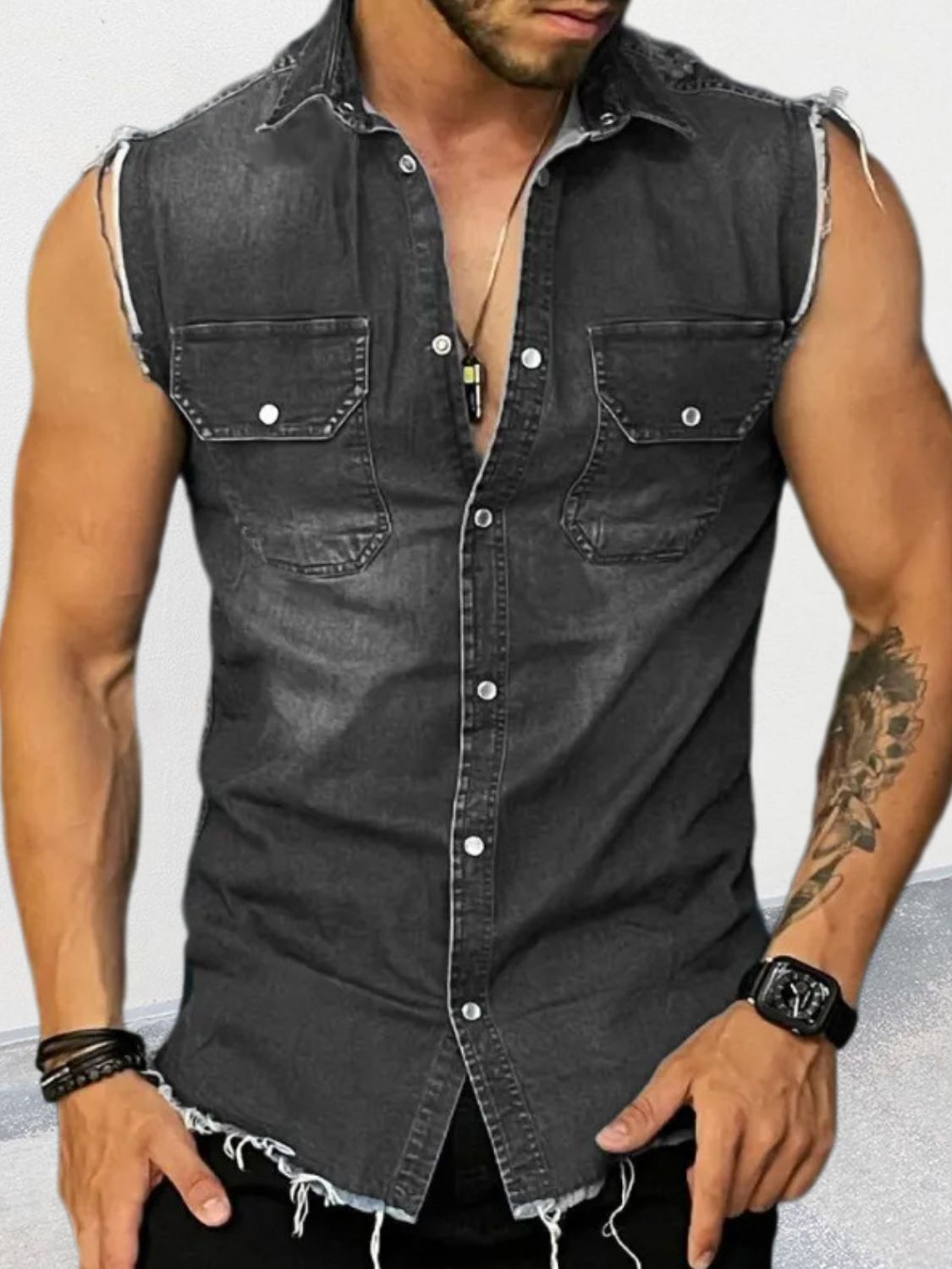 Affordable sleeveless denim top in black with a relaxed fit and frayed hem for casual wear