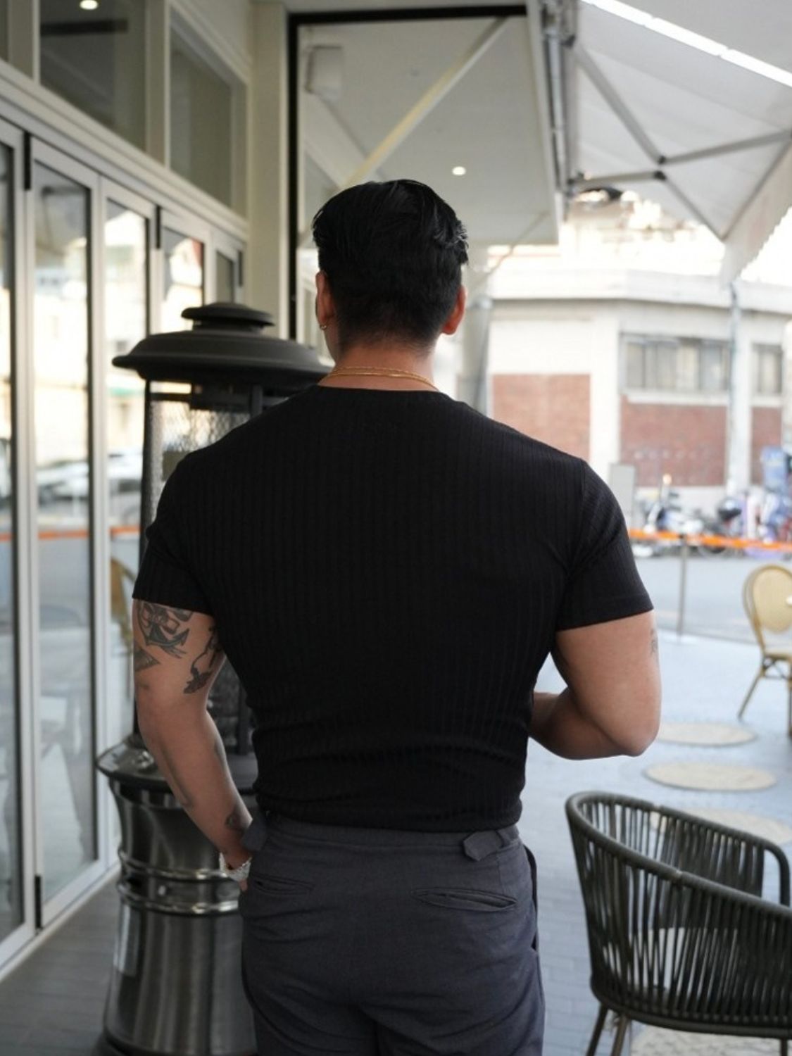 Men's black round neck short sleeve t-shirt designed for a comfortable fit and casual style