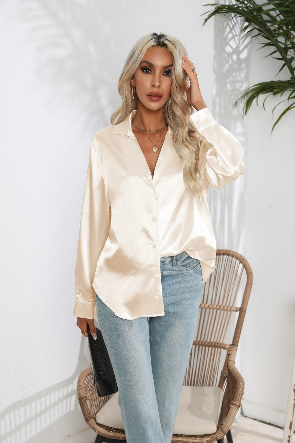 Trendsi Lapel Collar Long Sleeve Shirt in light cream paired with blue jeans for a chic look
